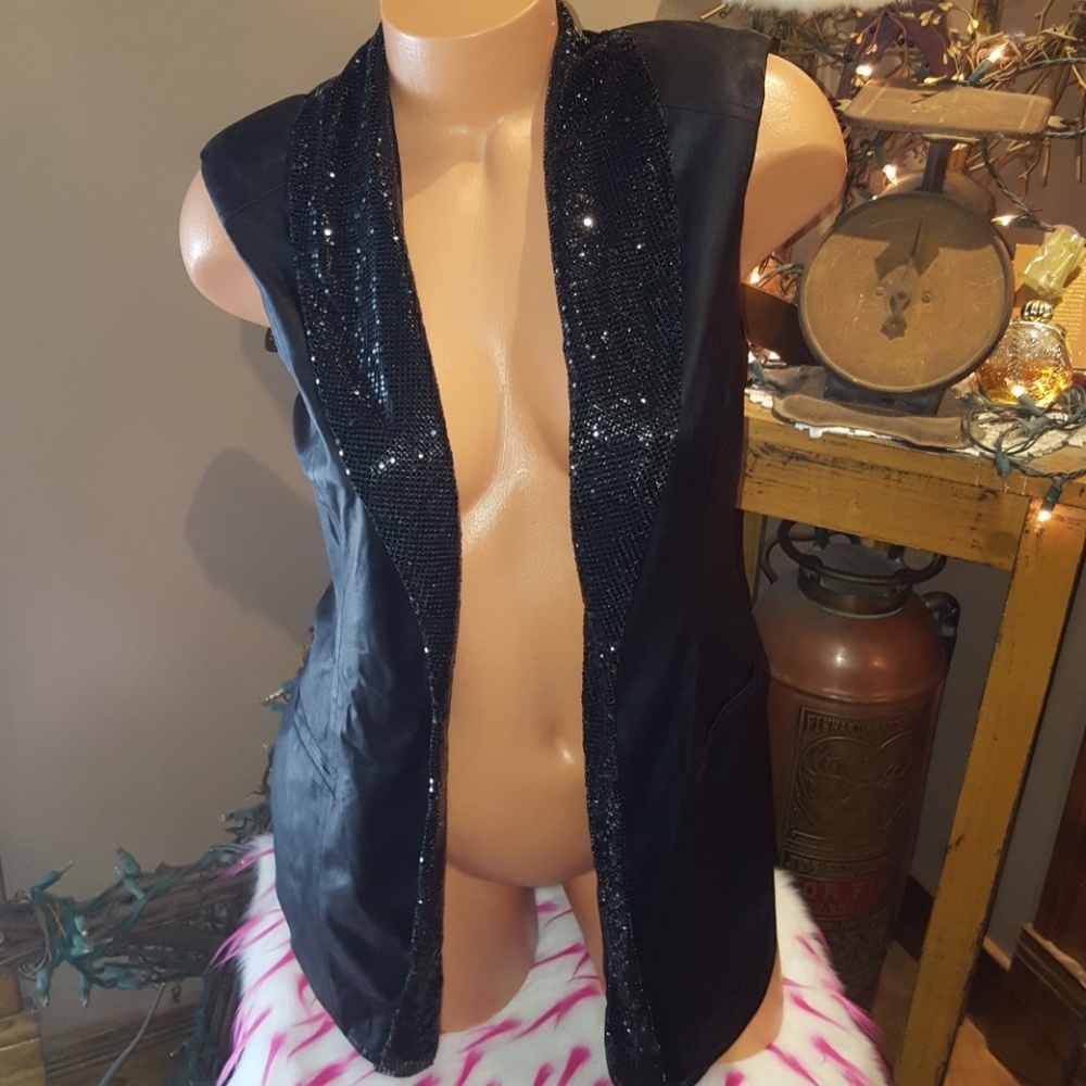 Bebe Kardashians metal grommet vest S